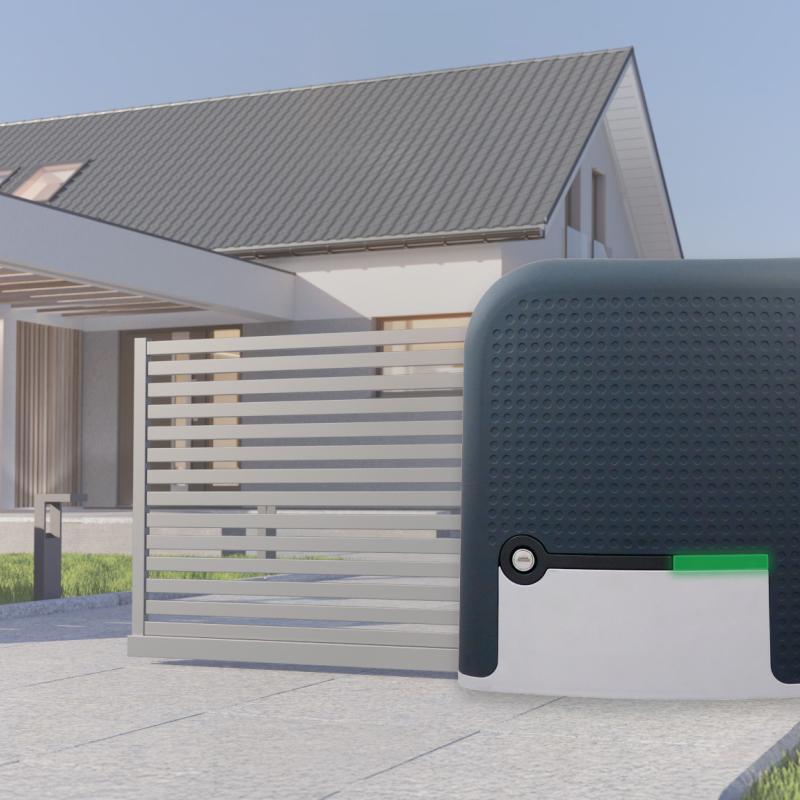 A Juno slide gate operator beside a residential driveway gate
